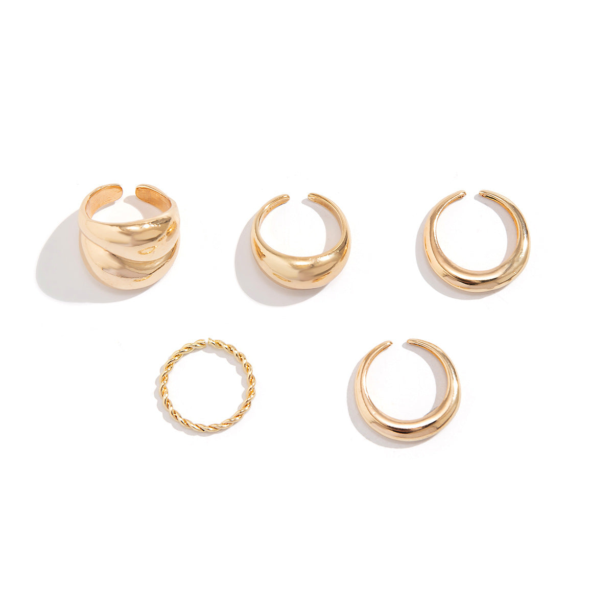 Design sense: simple hugging, smooth curved ring, layered style, niche geometric rings