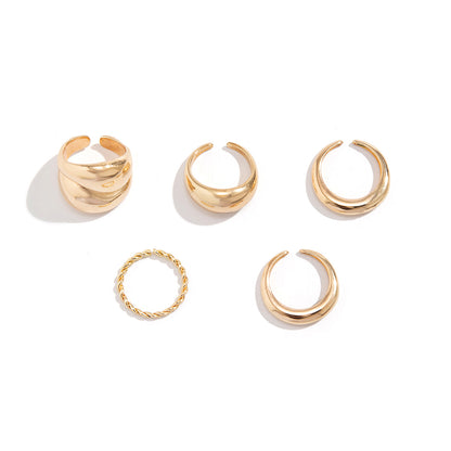 Design sense: simple hugging, smooth curved ring, layered style, niche geometric rings