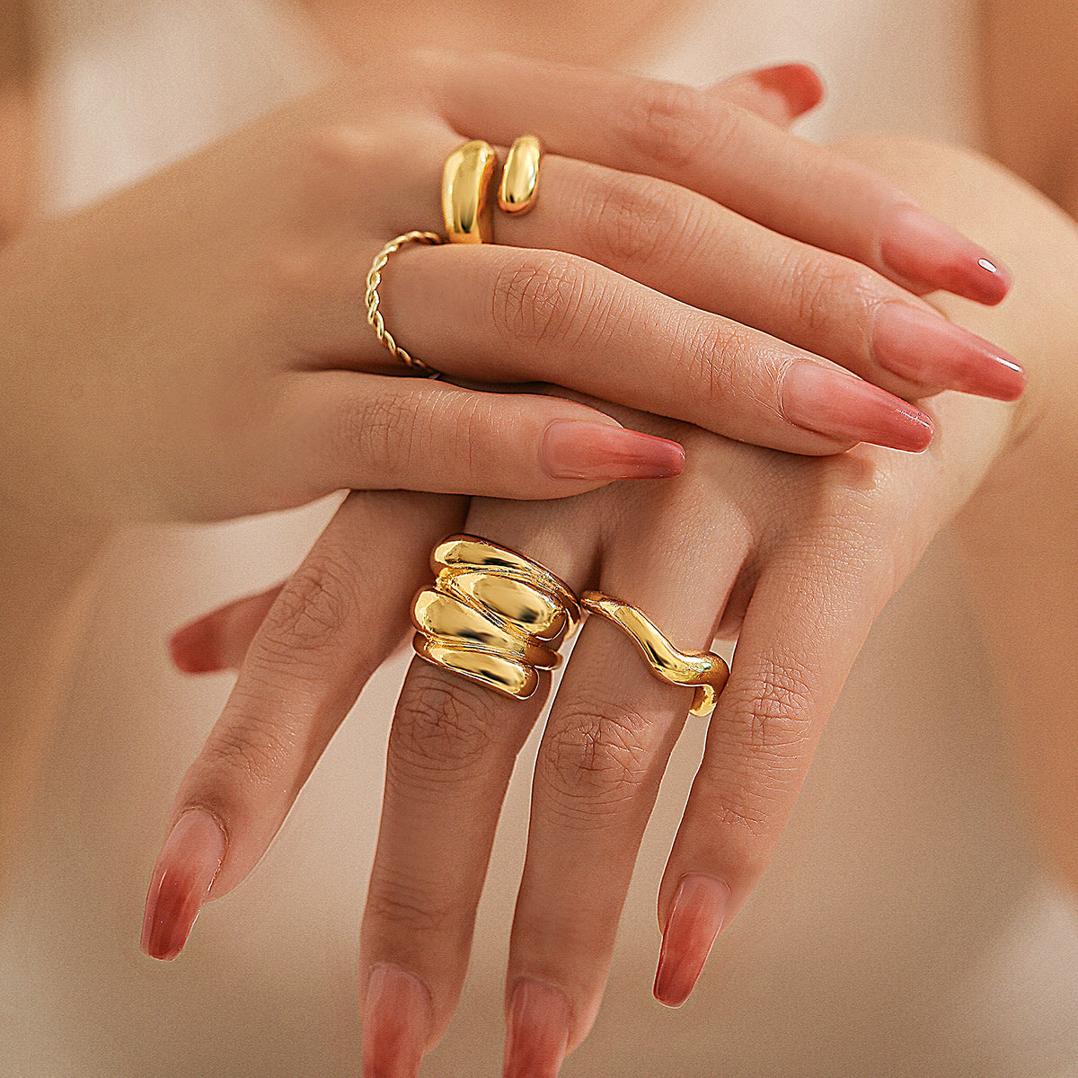 Design sense: simple hugging, smooth curved ring, layered style, niche geometric rings